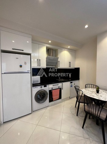 Квартира 1+1 в престижной резиденции Махмутлара, 55 кв.м. - Ракурс 6