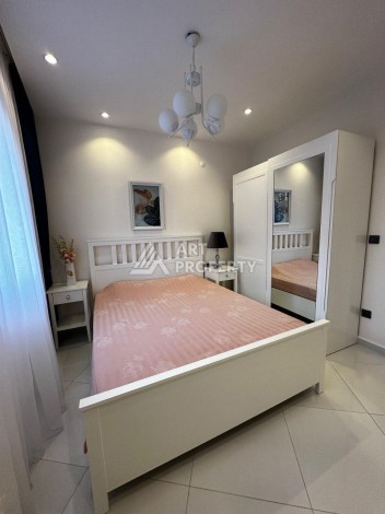 Квартира 1+1 в престижной резиденции Махмутлара, 55 кв.м. - Ракурс 10