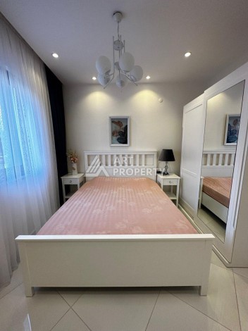 Квартира 1+1 в престижной резиденции Махмутлара, 55 кв.м. - Ракурс 13