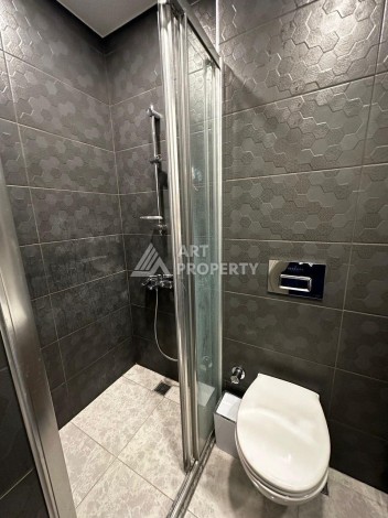 Квартира 1+1 в престижной резиденции Махмутлара, 55 кв.м. - Ракурс 16