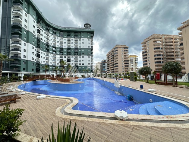 Квартира 1+1 в престижной резиденции Махмутлара, 55 кв.м. - Ракурс 21