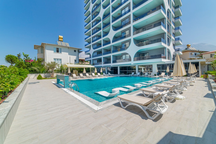 Квартира 1+1 в новом комплексе с инфраструктурой 5* отеля в тихом месте Махмутлара, 75 м2 - Ракурс 22