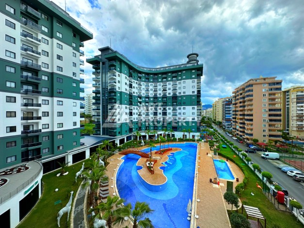 Квартира 1+1 в престижной резиденции Махмутлара, 55 кв.м. - Ракурс 22