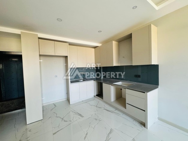 Апартаменты 1+1 в 250 метрах от моря в Каргыджаке. Есть рассрочка платежа - Ракурс 2