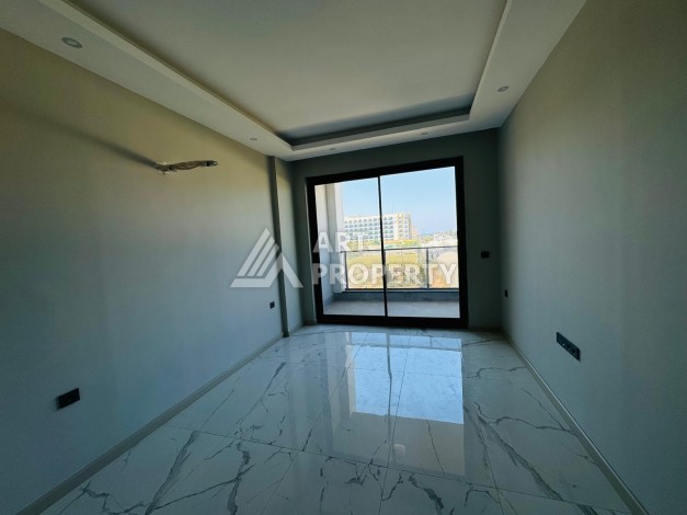 Апартаменты 1+1 в 250 метрах от моря в Каргыджаке. Есть рассрочка платежа - Ракурс 4