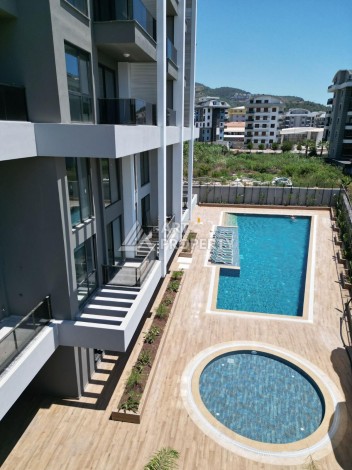 Апартаменты 1+1 в 250 метрах от моря в Каргыджаке. Есть рассрочка платежа - Ракурс 10