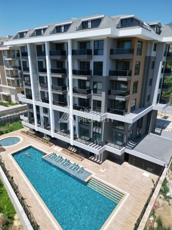 Апартаменты 1+1 в 250 метрах от моря в Каргыджаке. Есть рассрочка платежа - Ракурс 11