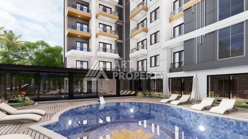 Современные квартиры 1+1 в центре Махмутлара, 50 кв.м. - Ракурс 2