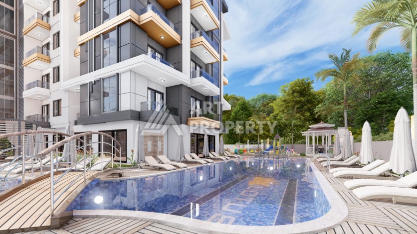 Современные квартиры 1+1 в центре Махмутлара, 50 кв.м. - Ракурс 4