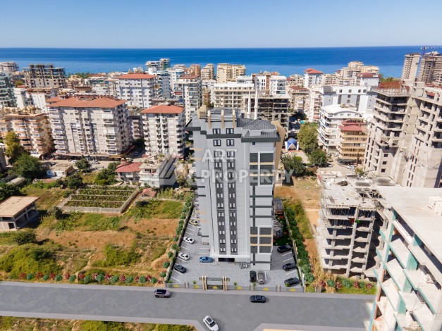 Современные квартиры 1+1 в центре Махмутлара, 50 кв.м. - Ракурс 9