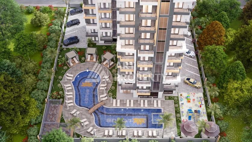 Современные квартиры 1+1 в центре Махмутлара, 50 кв.м. - Ракурс 11