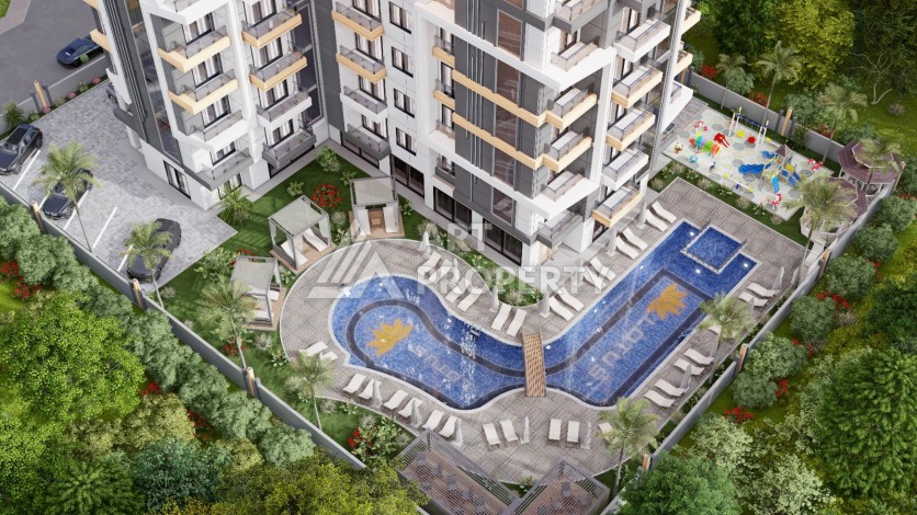 Современные квартиры 1+1 в центре Махмутлара, 50 кв.м. - Ракурс 12