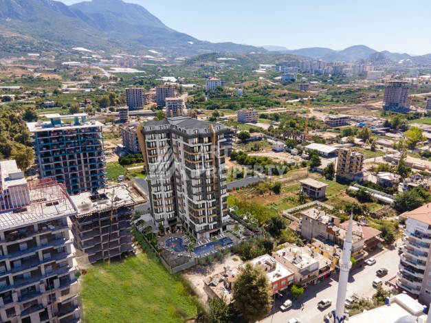 Современные квартиры 1+1 в центре Махмутлара, 50 кв.м. - Ракурс 14