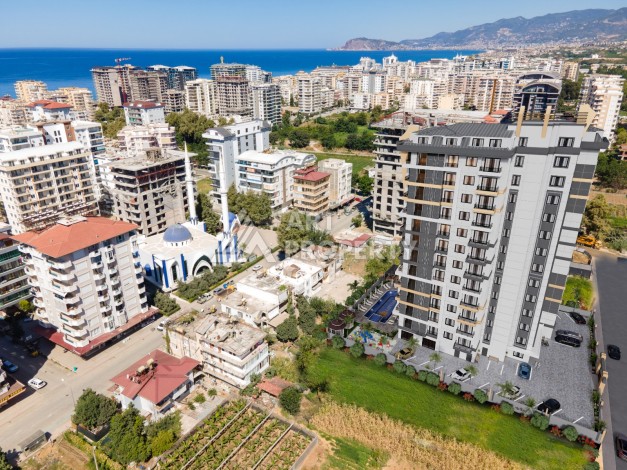 Современные квартиры 1+1 в центре Махмутлара, 50 кв.м. - Ракурс 16