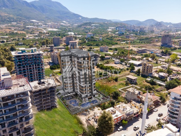 Современные квартиры 1+1 в центре Махмутлара, 50 кв.м. - Ракурс 18