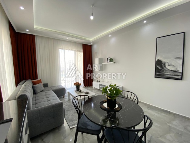 Новая квартира 1+1 в центре Махмутлара, 50 кв.м. - Ракурс 6