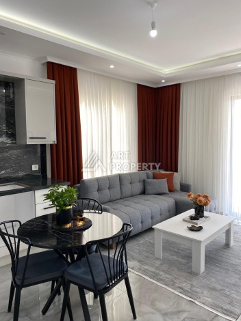 Новая квартира 1+1 в центре Махмутлара, 50 кв.м. - Ракурс 9