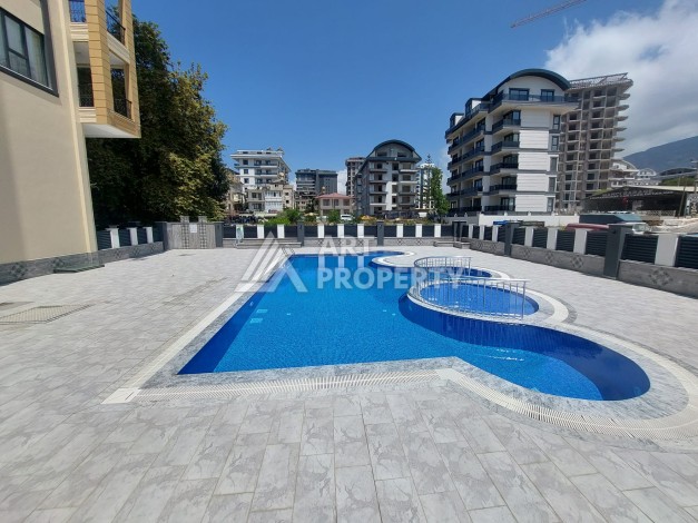 Новая квартира 1+1 в центре Махмутлара, 50 кв.м. - Ракурс 12