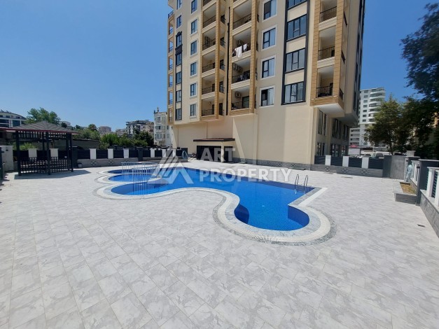 Новая квартира 1+1 в центре Махмутлара, 50 кв.м. - Ракурс 22