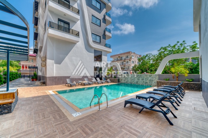 Однокомнатная квартира 1+1, новая резиденция, 60 кв.м. Махмутлар, Алания - Ракурс 2