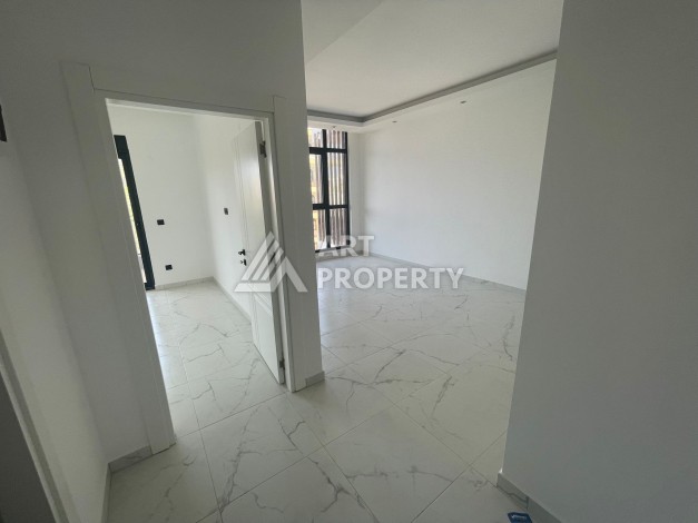 Однокомнатная квартира 1+1, новая резиденция, 60 кв.м. Махмутлар, Алания - Ракурс 7