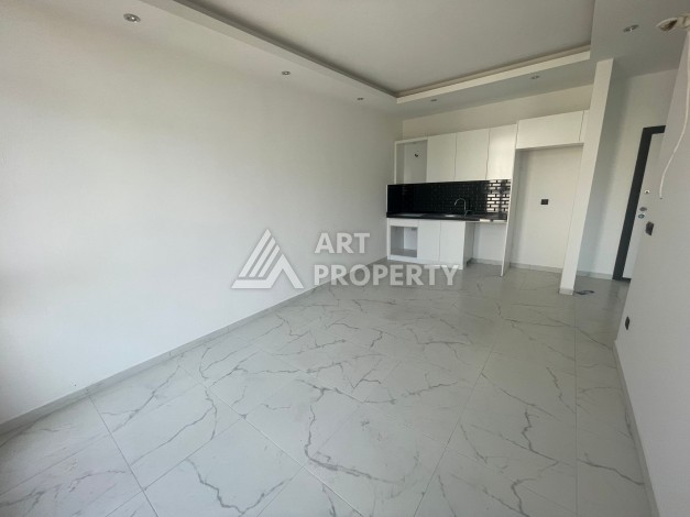 Однокомнатная квартира 1+1, новая резиденция, 60 кв.м. Махмутлар, Алания - Ракурс 8