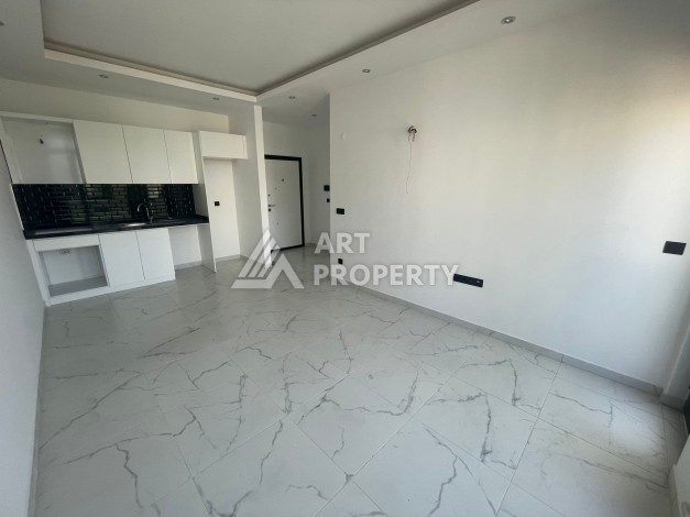 Однокомнатная квартира 1+1, новая резиденция, 60 кв.м. Махмутлар, Алания - Ракурс 10