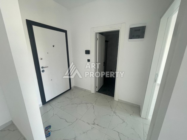 Однокомнатная квартира 1+1, новая резиденция, 60 кв.м. Махмутлар, Алания - Ракурс 15