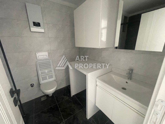 Однокомнатная квартира 1+1, новая резиденция, 60 кв.м. Махмутлар, Алания - Ракурс 16