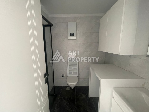 Однокомнатная квартира 1+1, новая резиденция, 60 кв.м. Махмутлар, Алания - Ракурс 17