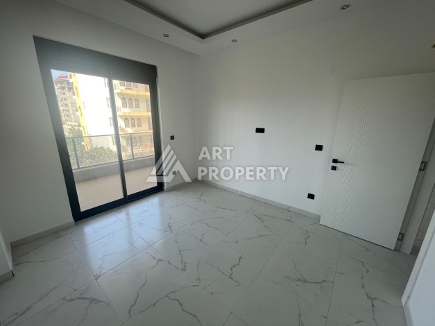 Однокомнатная квартира 1+1, новая резиденция, 60 кв.м. Махмутлар, Алания - Ракурс 19