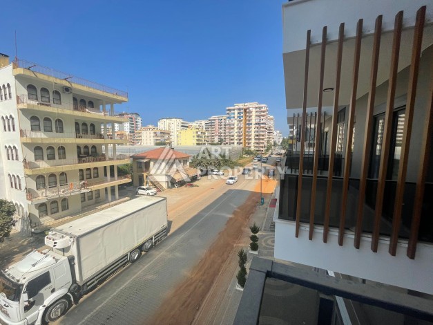 Однокомнатная квартира 1+1, новая резиденция, 60 кв.м. Махмутлар, Алания - Ракурс 23