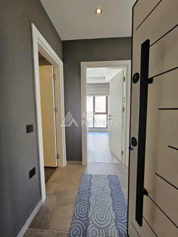 Меблированная квартира 1+1 в центре Махмутлара, 55 кв.м. Вид на море. - Ракурс 12