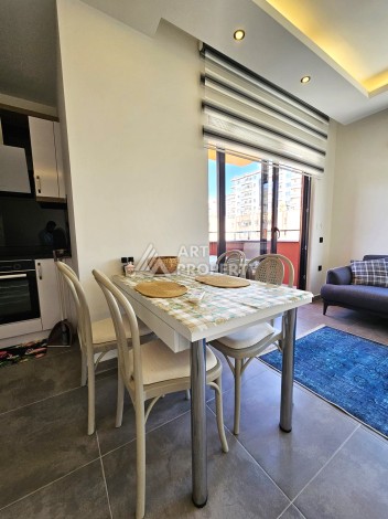 Меблированная квартира 1+1 в центре Махмутлара, 55 кв.м. Вид на море. - Ракурс 16