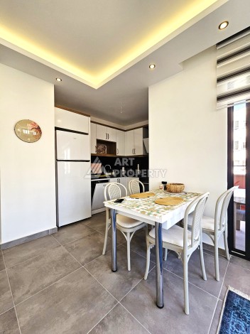 Меблированная квартира 1+1 в центре Махмутлара, 55 кв.м. Вид на море. - Ракурс 18