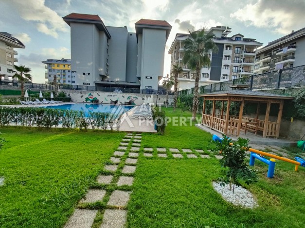 Современная квартира 1+1 в 150 метрах от моря. Каргыджак, Алания - Ракурс 11