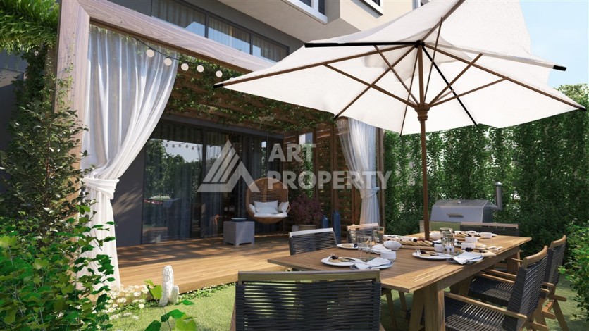 Резиденция с квартирами 1+1, дуплексами 2+1 и 3+1 в Махмутларе, от 50 до 133 кв.м. - Ракурс 6