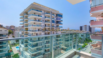 Полностью меблированные апартаменты 1+1 в роскошном комплексе в Махмутларе, 70м2 - Ракурс 18