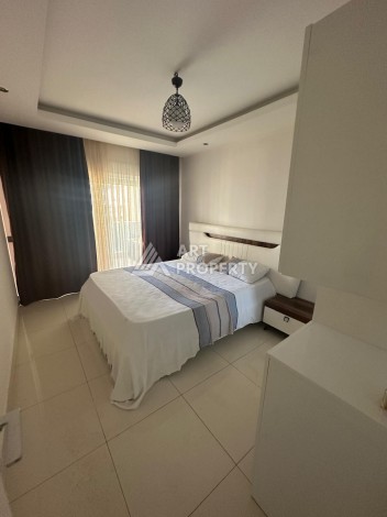 Просторная квартира 1+1 в резиденции с отельной концепцией, 65 кв.м. Тосмур, Алания - Ракурс 8