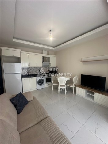 Квартира 1+1 в районе Махмутлар, 400 м до моря - Ракурс 6