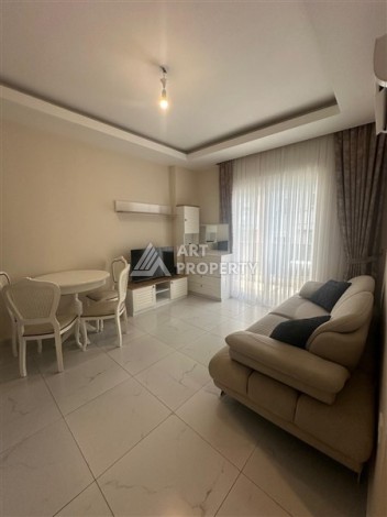 Квартира 1+1 в районе Махмутлар, 400 м до моря - Ракурс 7