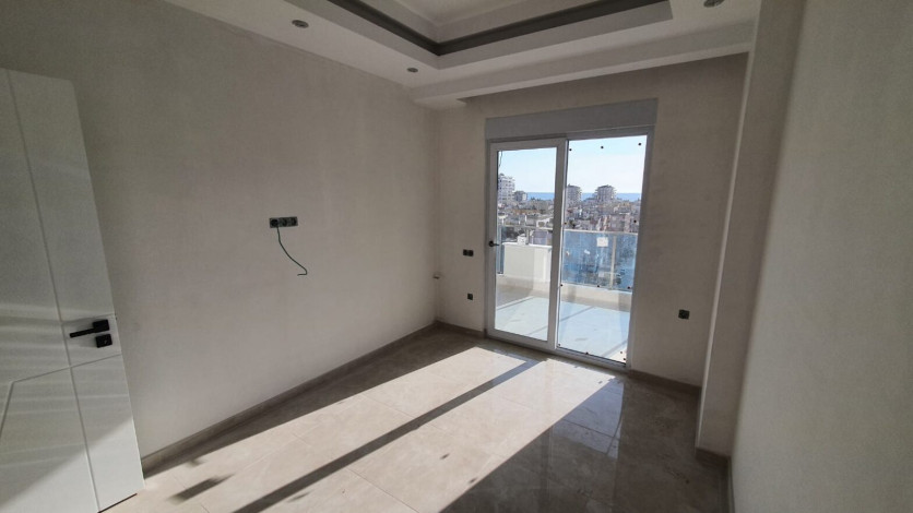 Двухкомнатная квартира в новом комплексе с полной инфраструктурой в центре Махмутлара, 65м2 - Ракурс 3