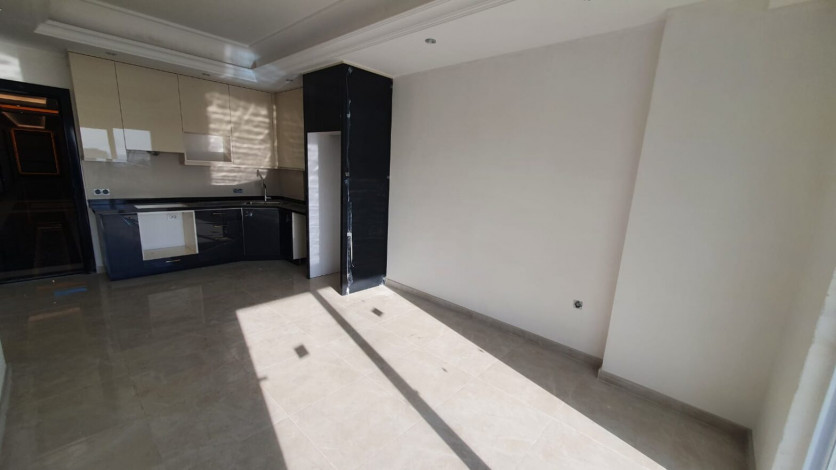 Двухкомнатная квартира в новом комплексе с полной инфраструктурой в центре Махмутлара, 65м2 - Ракурс 5