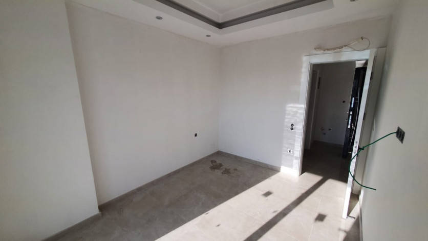 Двухкомнатная квартира в новом комплексе с полной инфраструктурой в центре Махмутлара, 65м2 - Ракурс 7