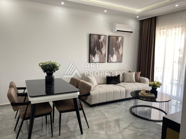 Уютная квартира 1+1 в новом комплексе в центре Махмутлара, 56 кв.м. - Ракурс 3