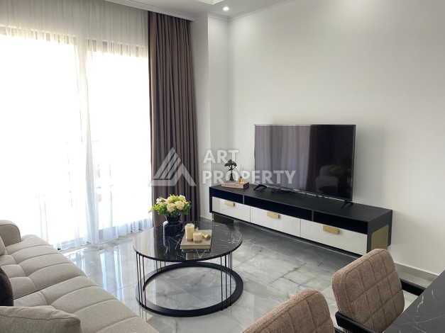 Уютная квартира 1+1 в новом комплексе в центре Махмутлара, 56 кв.м. - Ракурс 4