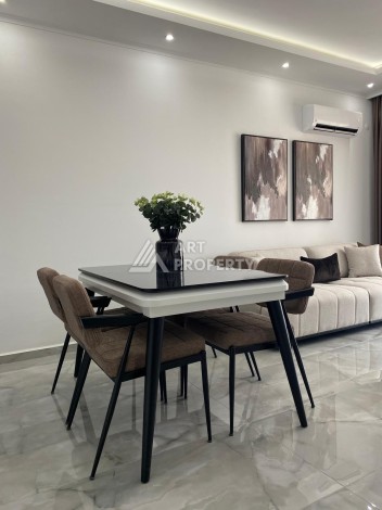 Уютная квартира 1+1 в новом комплексе в центре Махмутлара, 56 кв.м. - Ракурс 5