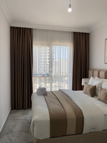 Уютная квартира 1+1 в новом комплексе в центре Махмутлара, 56 кв.м. - Ракурс 10