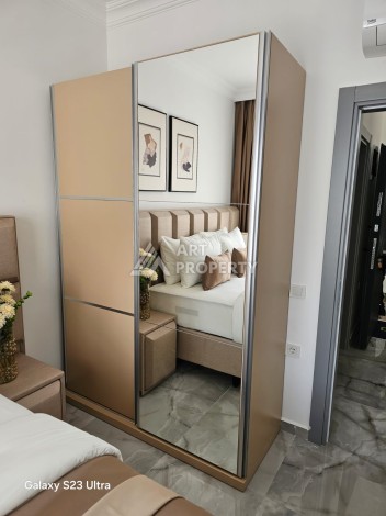 Уютная квартира 1+1 в новом комплексе в центре Махмутлара, 56 кв.м. - Ракурс 11