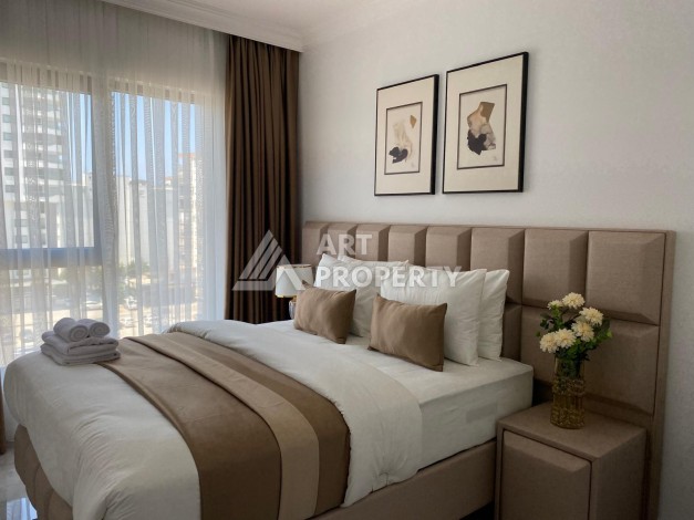 Уютная квартира 1+1 в новом комплексе в центре Махмутлара, 56 кв.м. - Ракурс 12